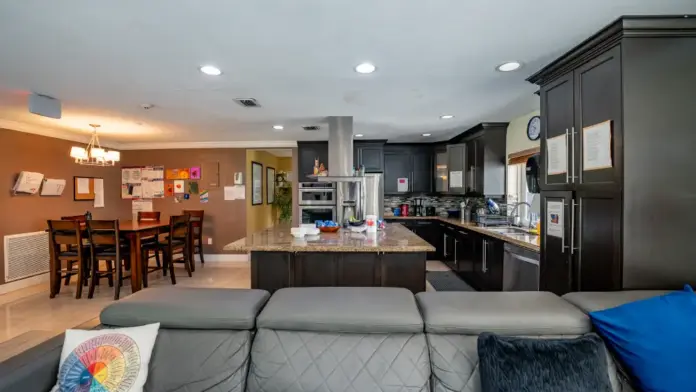 Kitchen and common sitting area at Reign Residential Treatment Center in Southwest Ranches, FL