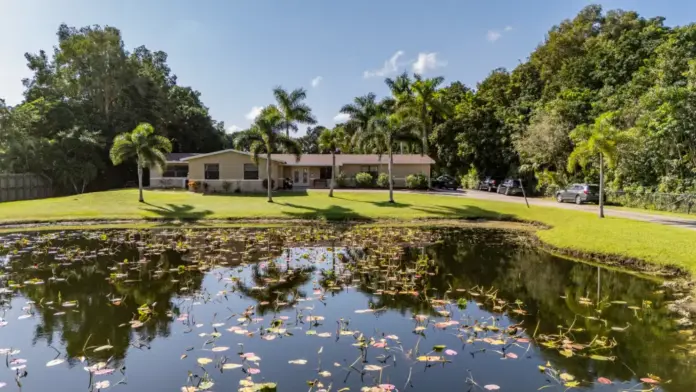 Exterior grounds shot at Reign Residential Treatment Center in Southwest Ranches, FL of the large outdoor pond area