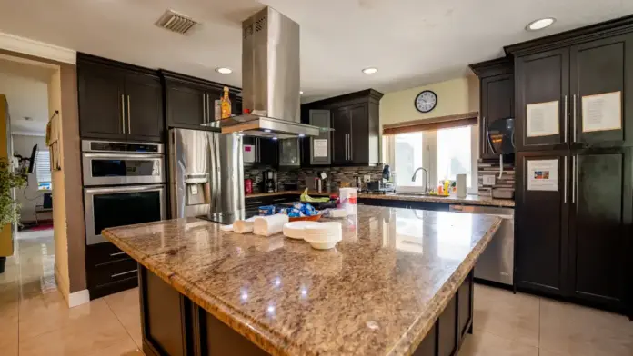 Kitchen, cooking, and eating area at at Reign Residential Treatment Center in Southwest Ranches, FL